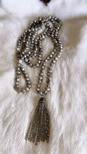 Pearls and Paved Tassel Crystal Pendant.