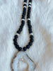 Open Crystal Druzy pendant surrounded by matte Agate & Black Lava stones.