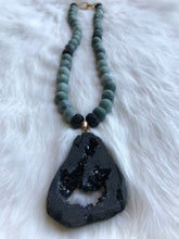 Open Black Crystal Druzy Pendant Surrounded by Serpentine.