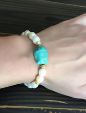 SOLD~Fresh Water Pearls & Carved Turquoise Buddha center stretch bracelet.