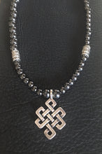 SOLD~Beaded Stretch Necklace in Hematite, Silver Celtic Pendant.