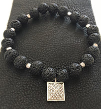 SOLD~Raw Lava stones square rhinestone center stretch bracelet